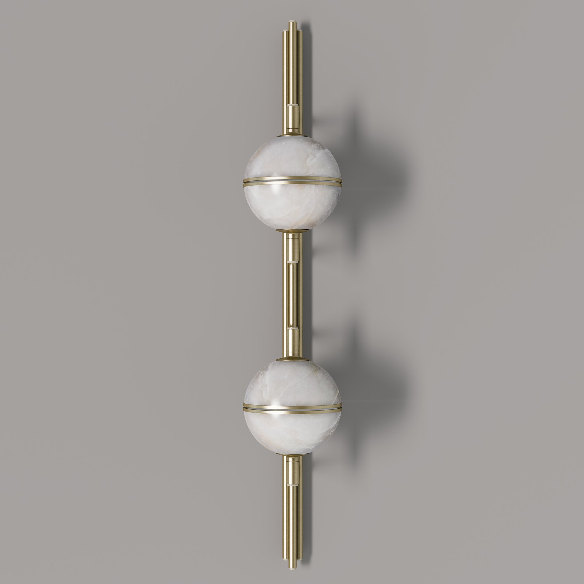 Andros II Wall Lamp Front view of the andros ii wall lamp with light turned off, highlighting the symmetrical design of the dual alabaster globes and vertical brass structure.
